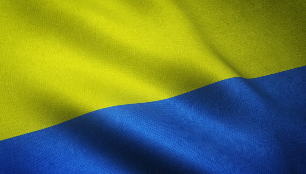 МВС опублікувало винятки щодо обмеження виїзду з України чоловікам closeup shot realistic flag ukraine with interesting textures 1024x585
